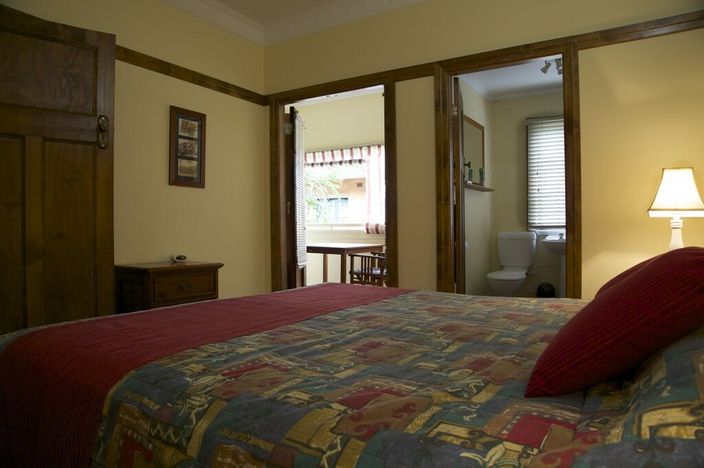 Bedroom opening onto a private balcony