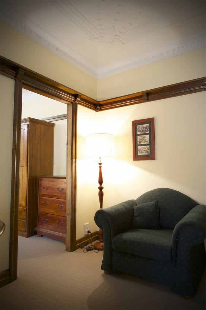 Bedroom with heritage timber dresser